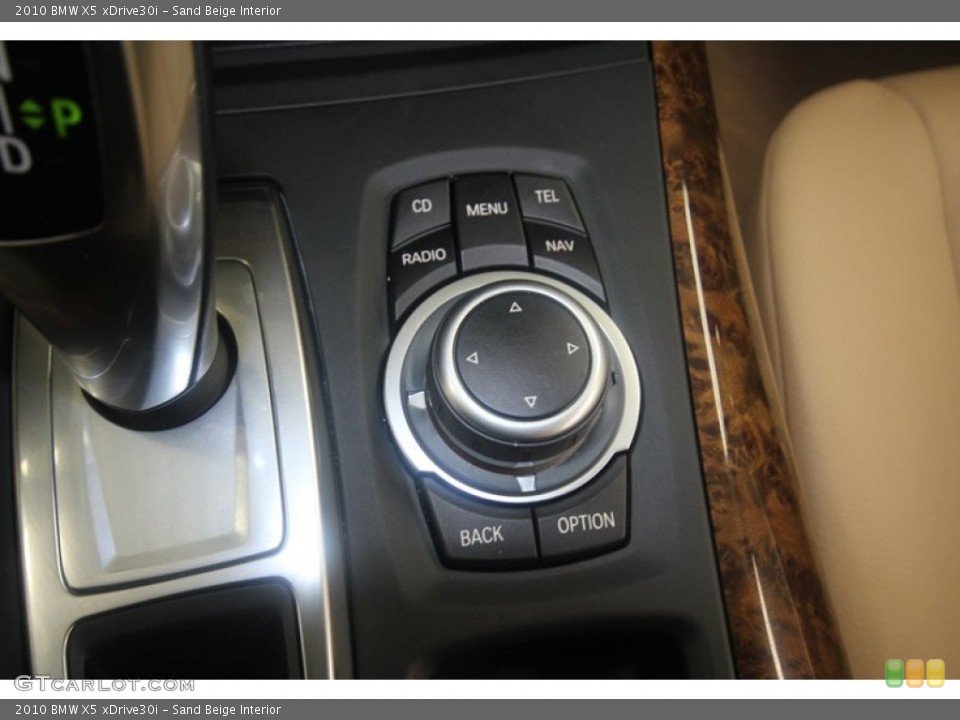 Sand Beige Interior Controls for the 2010 BMW X5 xDrive30i #70848501