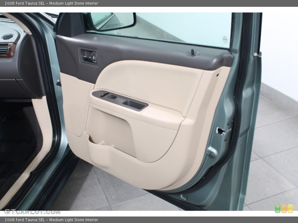 Medium Light Stone Interior Door Panel for the 2008 Ford Taurus SEL #70872718