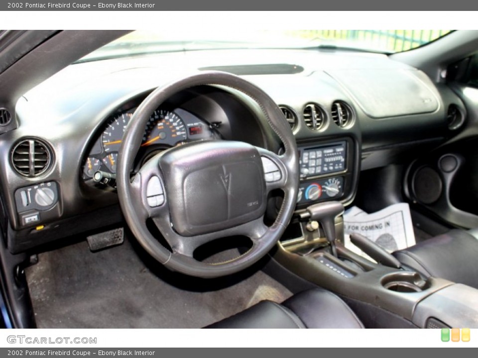 Ebony Black Interior Dashboard for the 2002 Pontiac Firebird Coupe #70883650