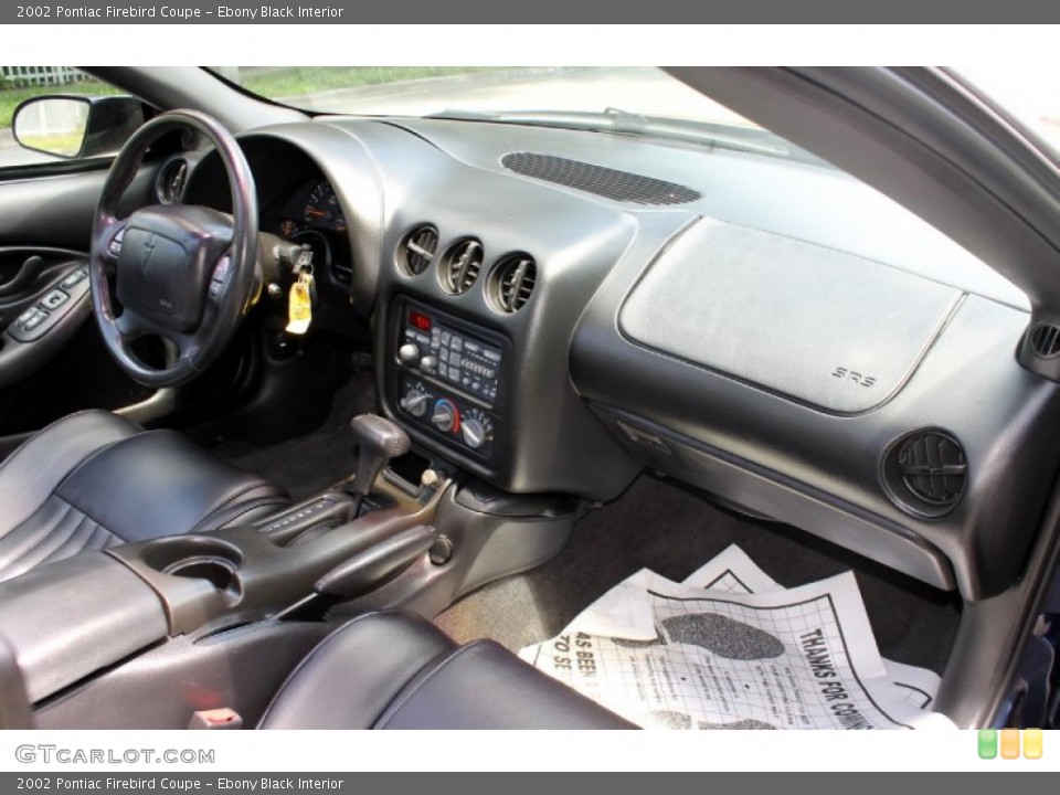 Ebony Black Interior Dashboard for the 2002 Pontiac Firebird Coupe #70883656