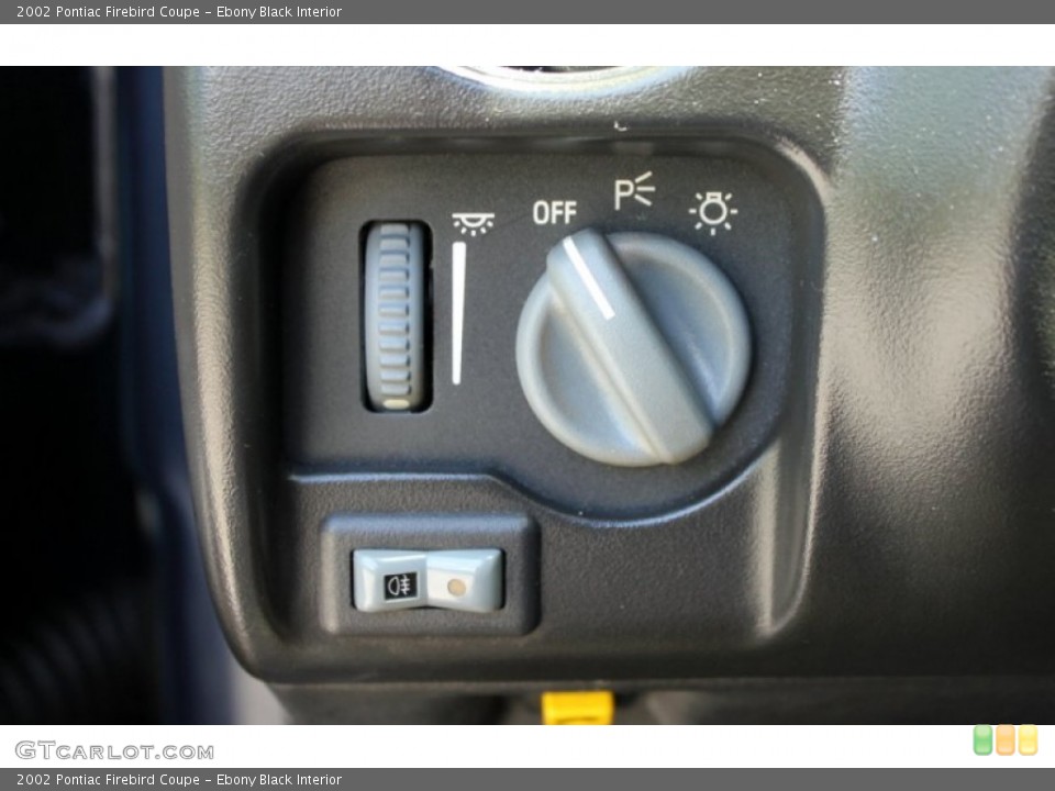 Ebony Black Interior Controls for the 2002 Pontiac Firebird Coupe #70883707