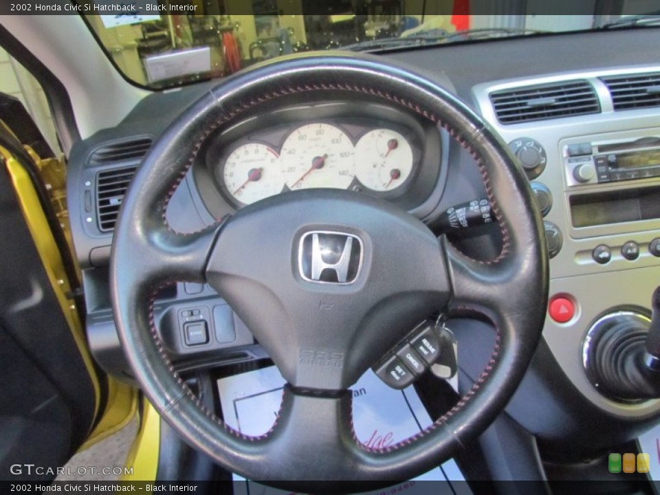 Black Interior Steering Wheel for the 2002 Honda Civic Si Hatchback #70932034