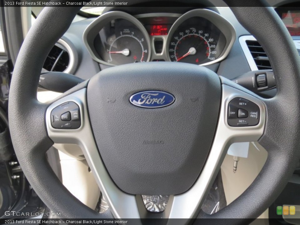 Charcoal Black/Light Stone Interior Steering Wheel for the 2013 Ford Fiesta SE Hatchback #70947847