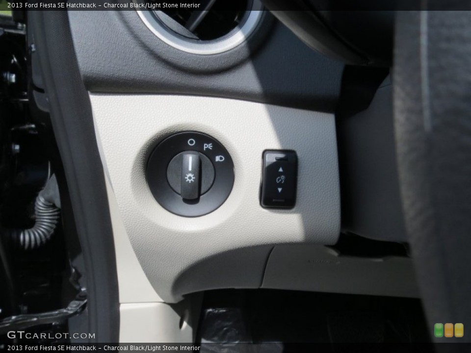 Charcoal Black/Light Stone Interior Controls for the 2013 Ford Fiesta SE Hatchback #70947865