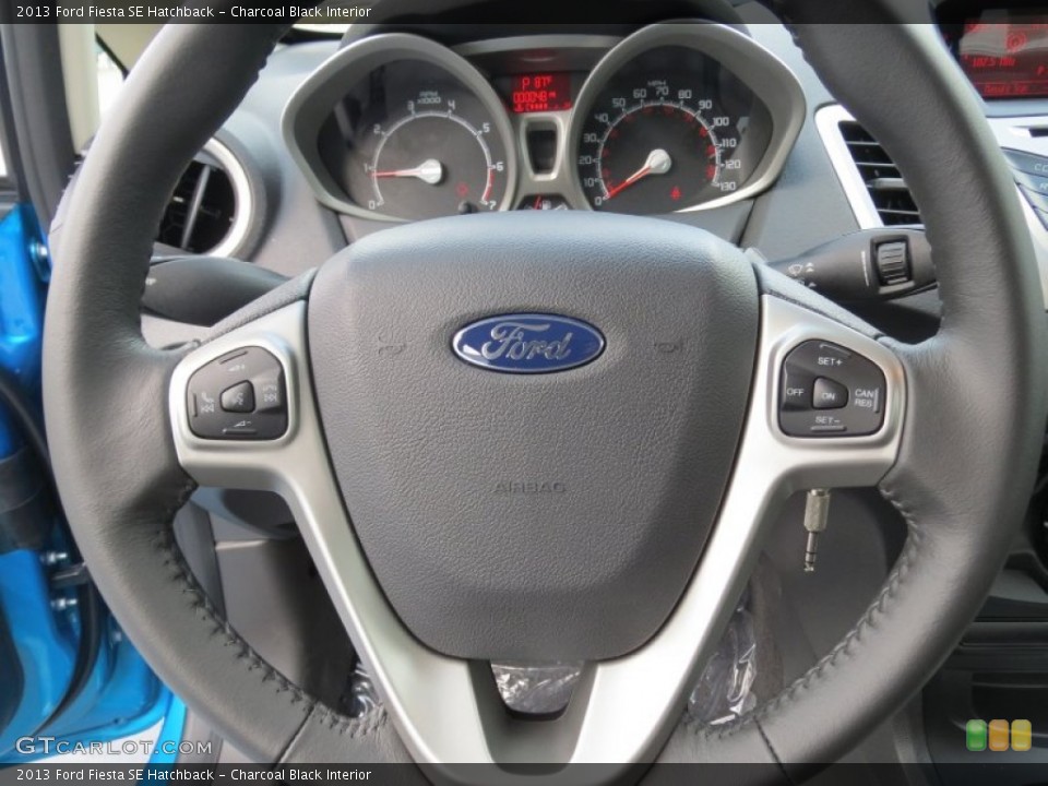 Charcoal Black Interior Steering Wheel for the 2013 Ford Fiesta SE Hatchback #70948114