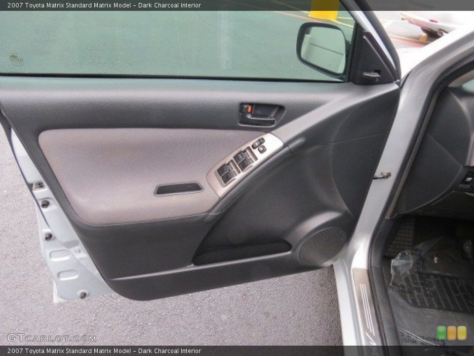 Dark Charcoal Interior Door Panel for the 2007 Toyota Matrix  #70977252