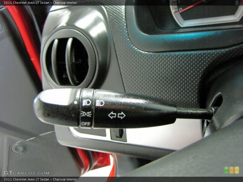 Charcoal Interior Controls for the 2011 Chevrolet Aveo LT Sedan #71005126