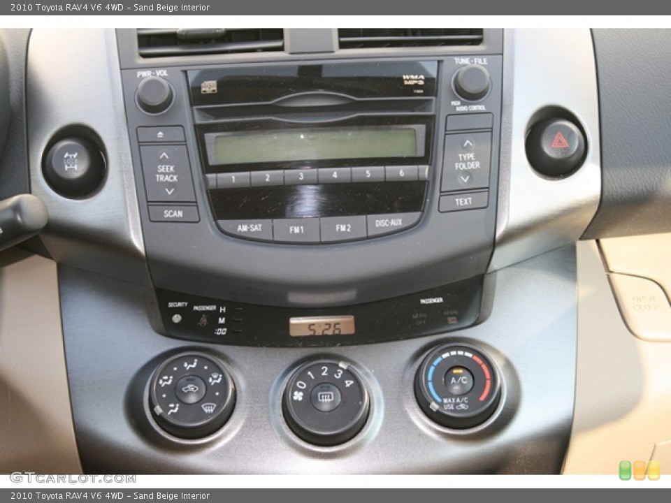 Sand Beige Interior Controls for the 2010 Toyota RAV4 V6 4WD #71049725