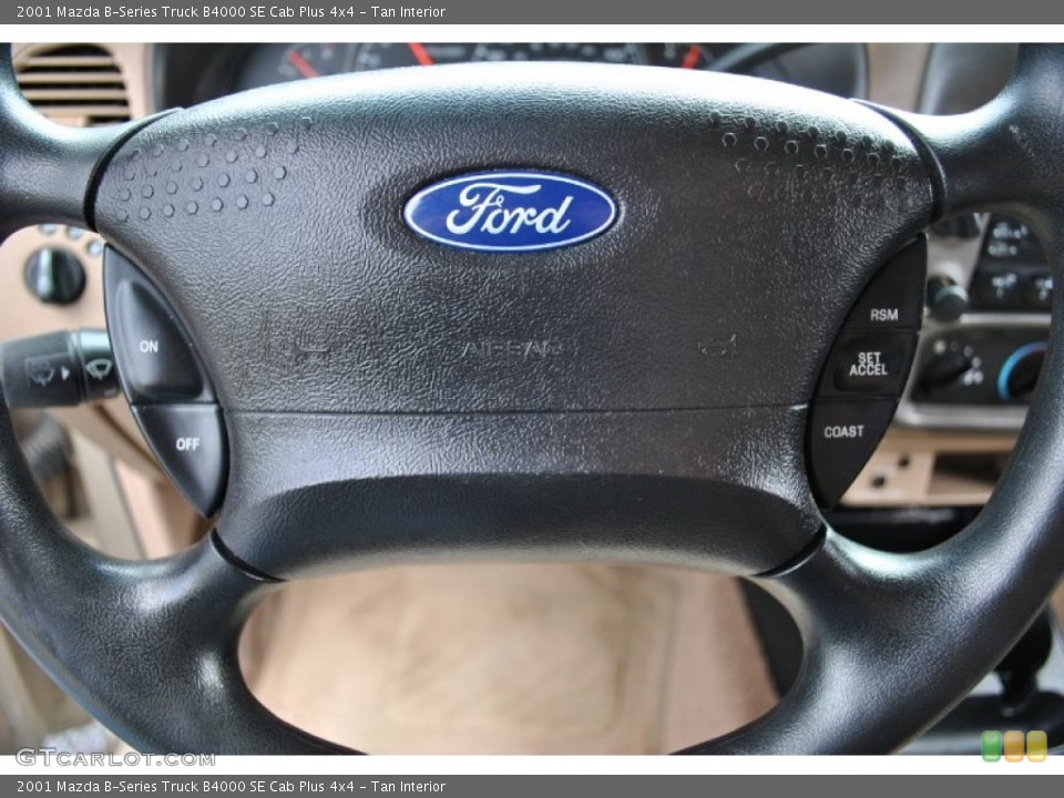 Tan Interior Controls for the 2001 Mazda B-Series Truck B4000 SE Cab Plus 4x4 #71075812