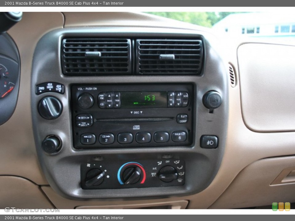 Tan Interior Controls for the 2001 Mazda B-Series Truck B4000 SE Cab Plus 4x4 #71075822