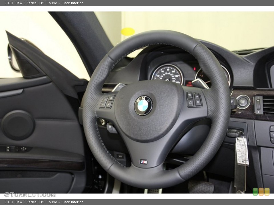 Black Interior Steering Wheel for the 2013 BMW 3 Series 335i Coupe #71087898