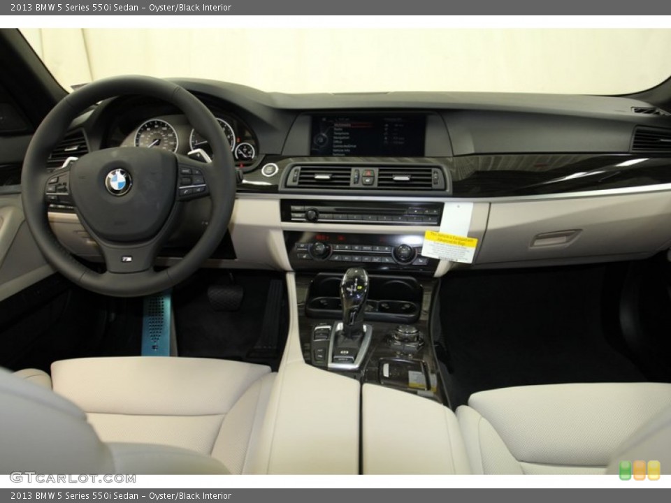 Oyster/Black Interior Dashboard for the 2013 BMW 5 Series 550i Sedan #71093143