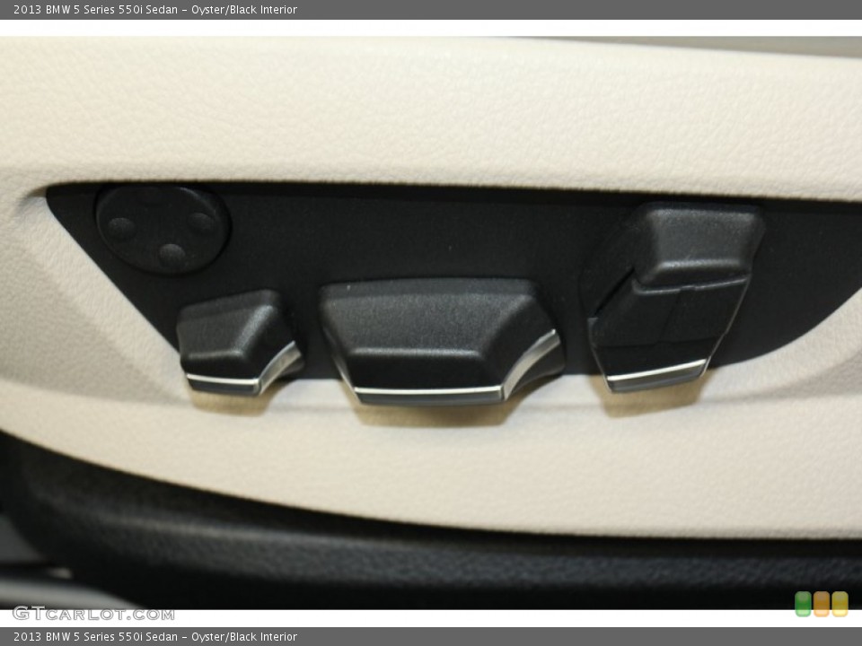 Oyster/Black Interior Controls for the 2013 BMW 5 Series 550i Sedan #71093242