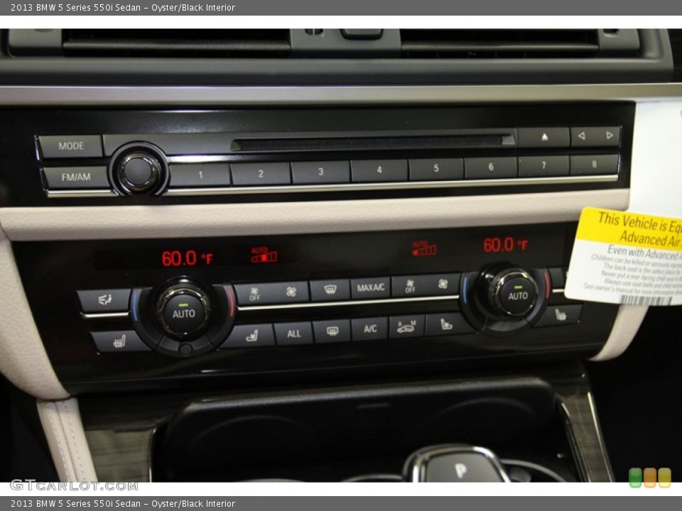 Oyster/Black Interior Controls for the 2013 BMW 5 Series 550i Sedan #71093261