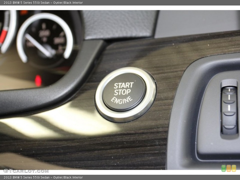 Oyster/Black Interior Controls for the 2013 BMW 5 Series 550i Sedan #71093293