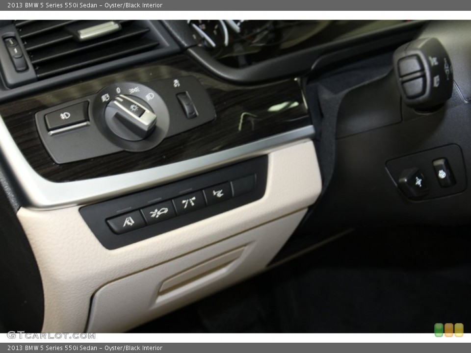 Oyster/Black Interior Controls for the 2013 BMW 5 Series 550i Sedan #71093320