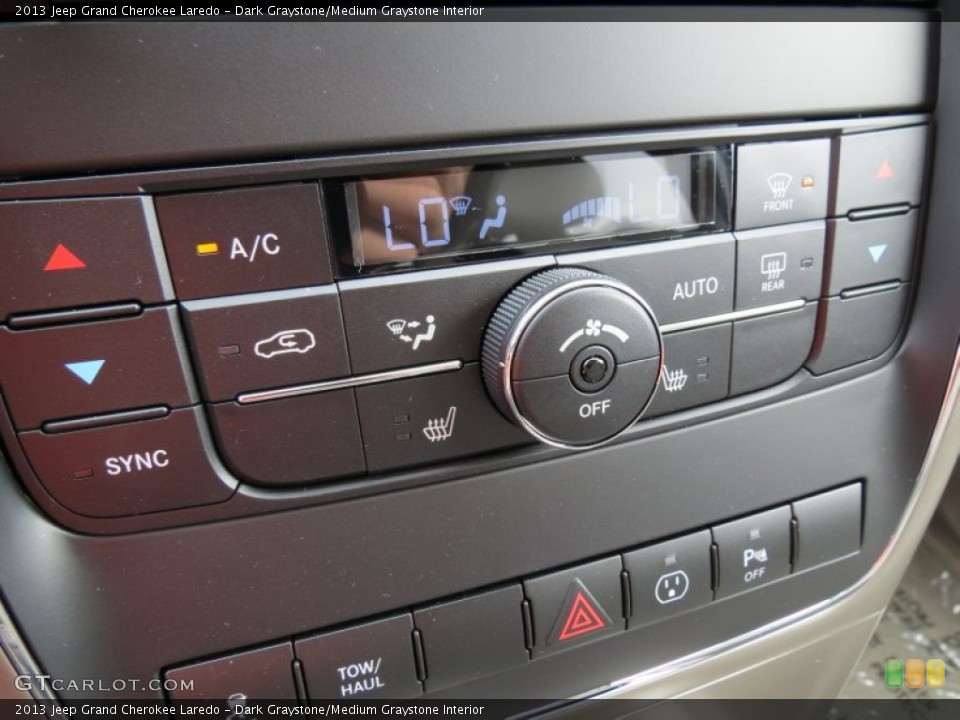 Dark Graystone/Medium Graystone Interior Controls for the 2013 Jeep Grand Cherokee Laredo #71127395