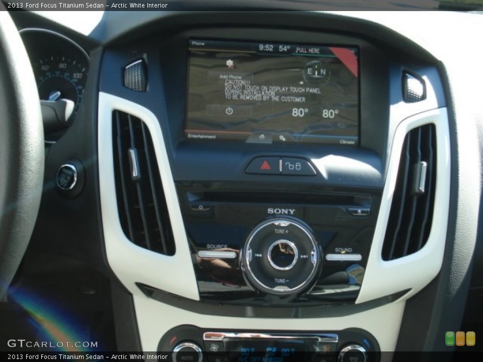 Arctic White Interior Controls for the 2013 Ford Focus Titanium Sedan #71130923