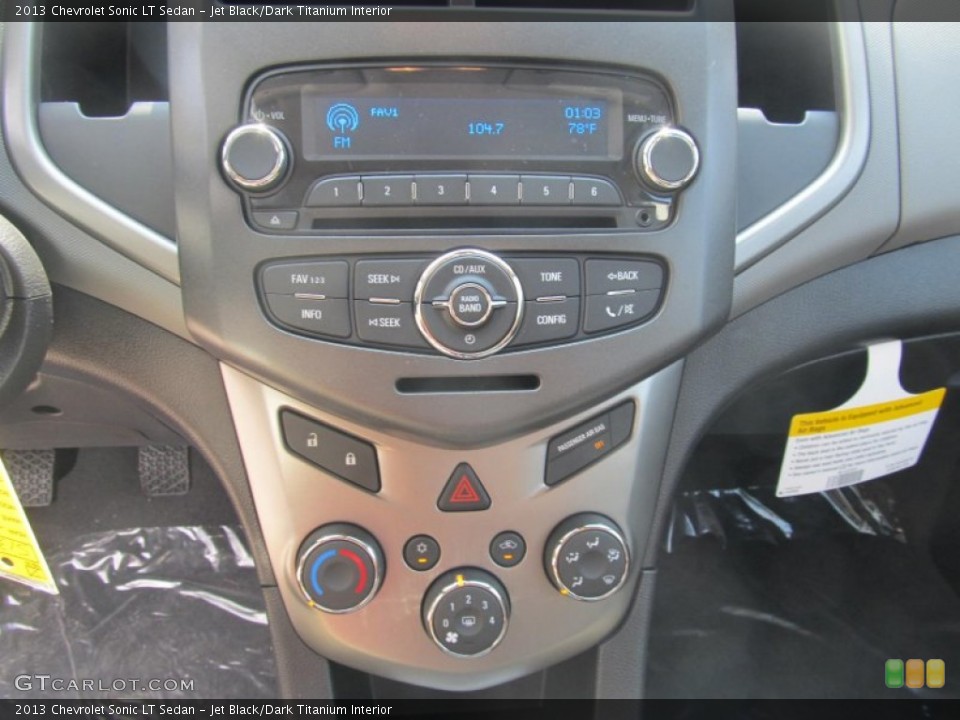 Jet Black/Dark Titanium Interior Controls for the 2013 Chevrolet Sonic LT Sedan #71139397
