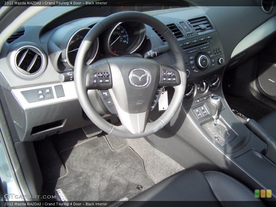 Black Interior Dashboard for the 2012 Mazda MAZDA3 i Grand Touring 4 Door #71164359