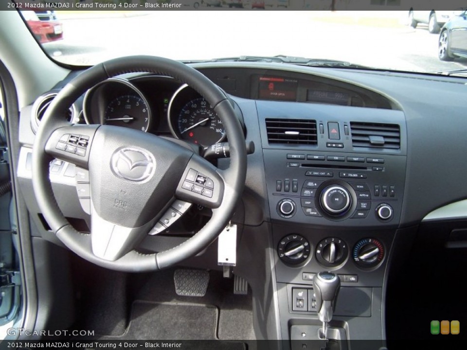 Black Interior Dashboard for the 2012 Mazda MAZDA3 i Grand Touring 4 Door #71164377