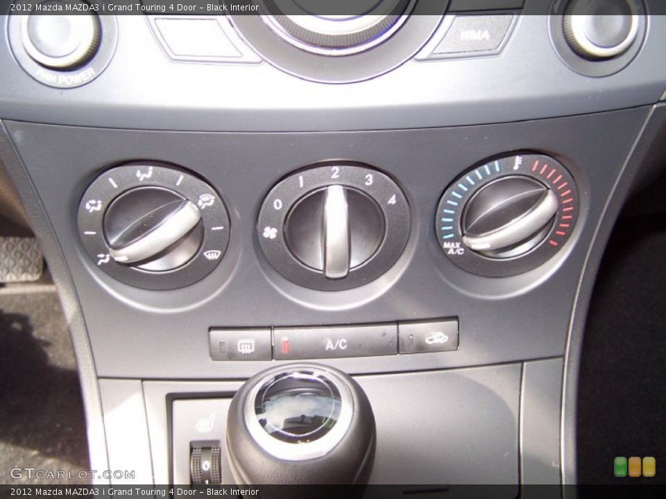 Black Interior Controls for the 2012 Mazda MAZDA3 i Grand Touring 4 Door #71164410