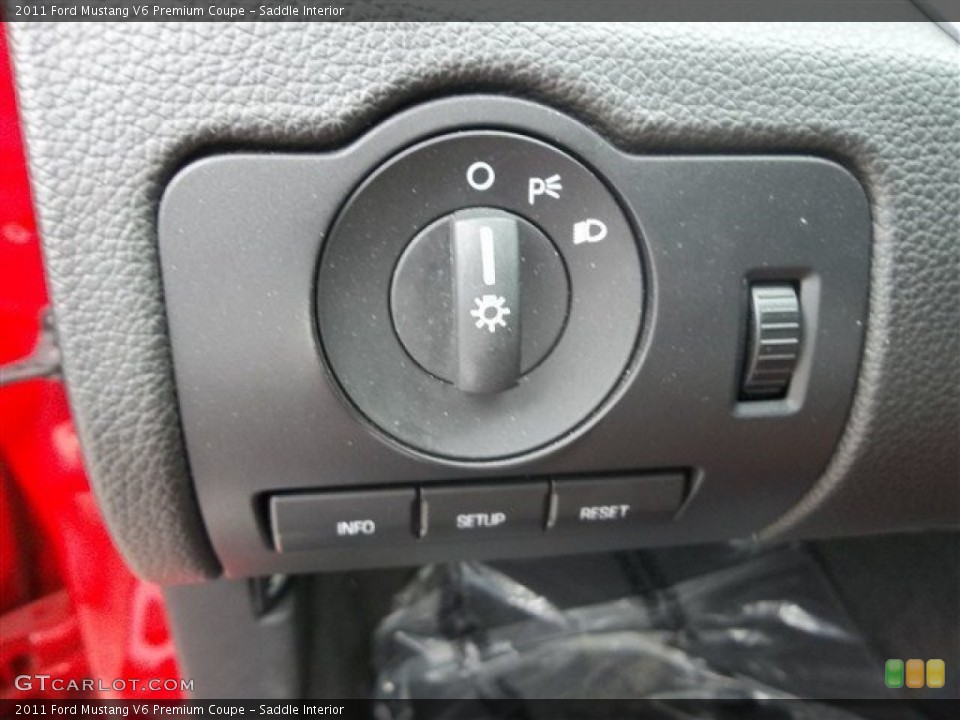 Saddle Interior Controls for the 2011 Ford Mustang V6 Premium Coupe #71198062