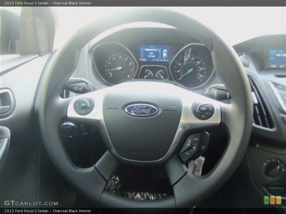Charcoal Black Interior Steering Wheel for the 2013 Ford Focus S Sedan #71199094