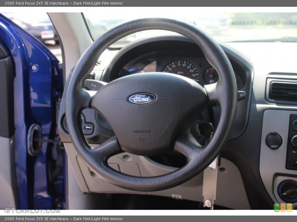Dark Flint/Light Flint Interior Steering Wheel for the 2005 Ford Focus ZX5 SE Hatchback #71247892