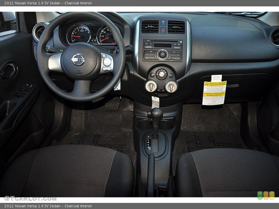 Charcoal Interior Dashboard for the 2012 Nissan Versa 1.6 SV Sedan #71275996