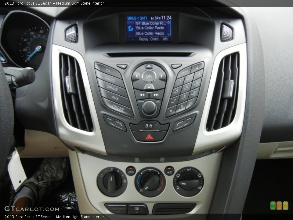 Medium Light Stone Interior Controls for the 2013 Ford Focus SE Sedan #71283021