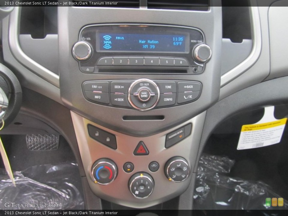 Jet Black/Dark Titanium Interior Controls for the 2013 Chevrolet Sonic LT Sedan #71284315