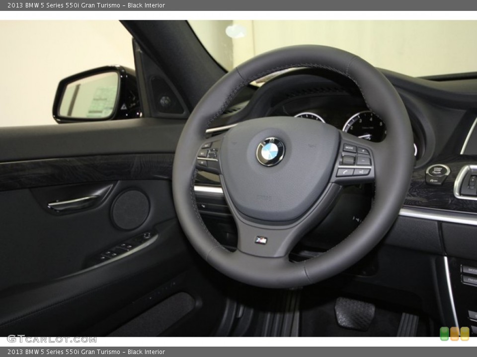 Black Interior Steering Wheel for the 2013 BMW 5 Series 550i Gran Turismo #71299402
