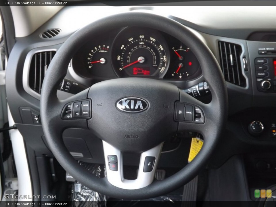 Black Interior Steering Wheel for the 2013 Kia Sportage LX #71364086