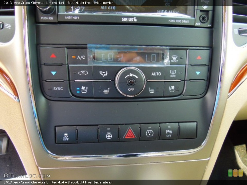 Black/Light Frost Beige Interior Controls for the 2013 Jeep Grand Cherokee Limited 4x4 #71379205