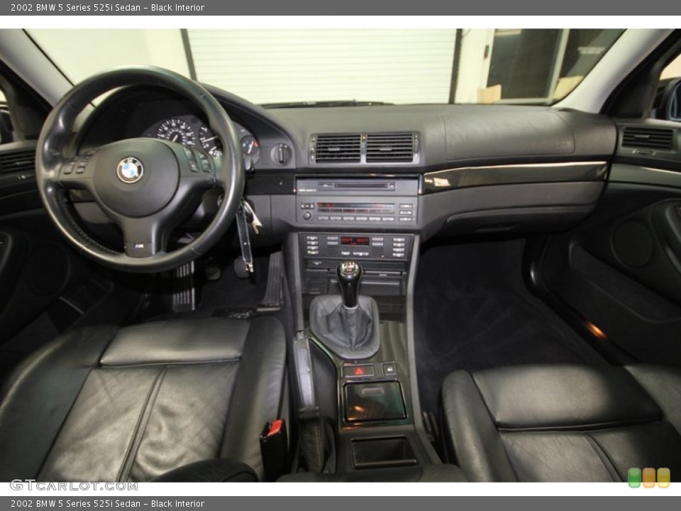 Black Interior Dashboard for the 2002 BMW 5 Series 525i Sedan #71388286