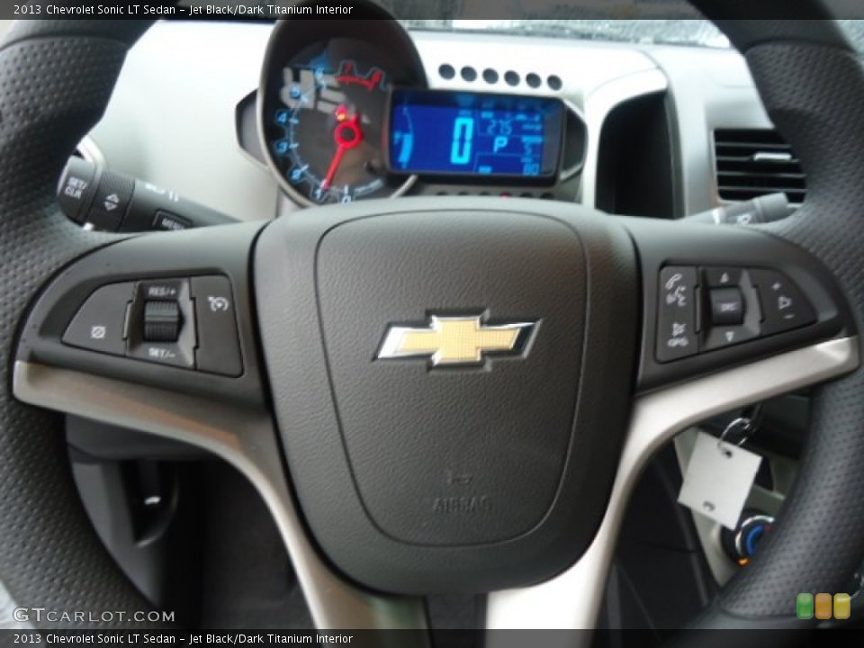 Jet Black/Dark Titanium Interior Controls for the 2013 Chevrolet Sonic LT Sedan #71393554