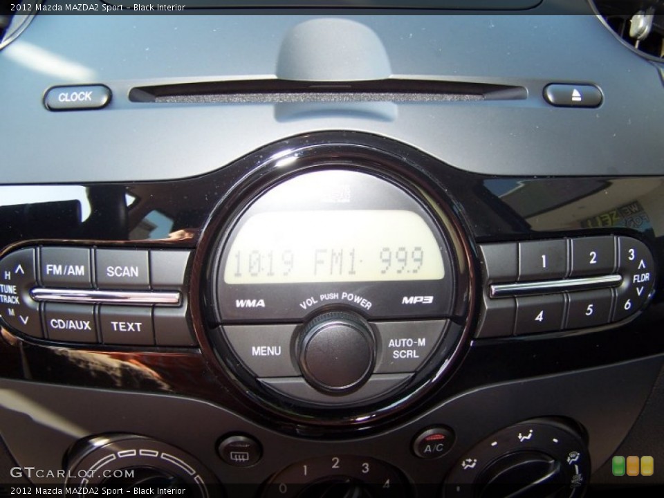 Black Interior Controls for the 2012 Mazda MAZDA2 Sport #71394358