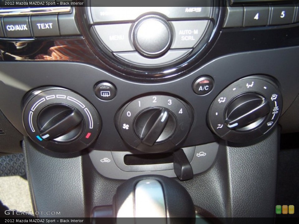 Black Interior Controls for the 2012 Mazda MAZDA2 Sport #71394368