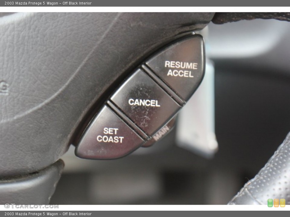 Off Black Interior Controls for the 2003 Mazda Protege 5 Wagon #71414647