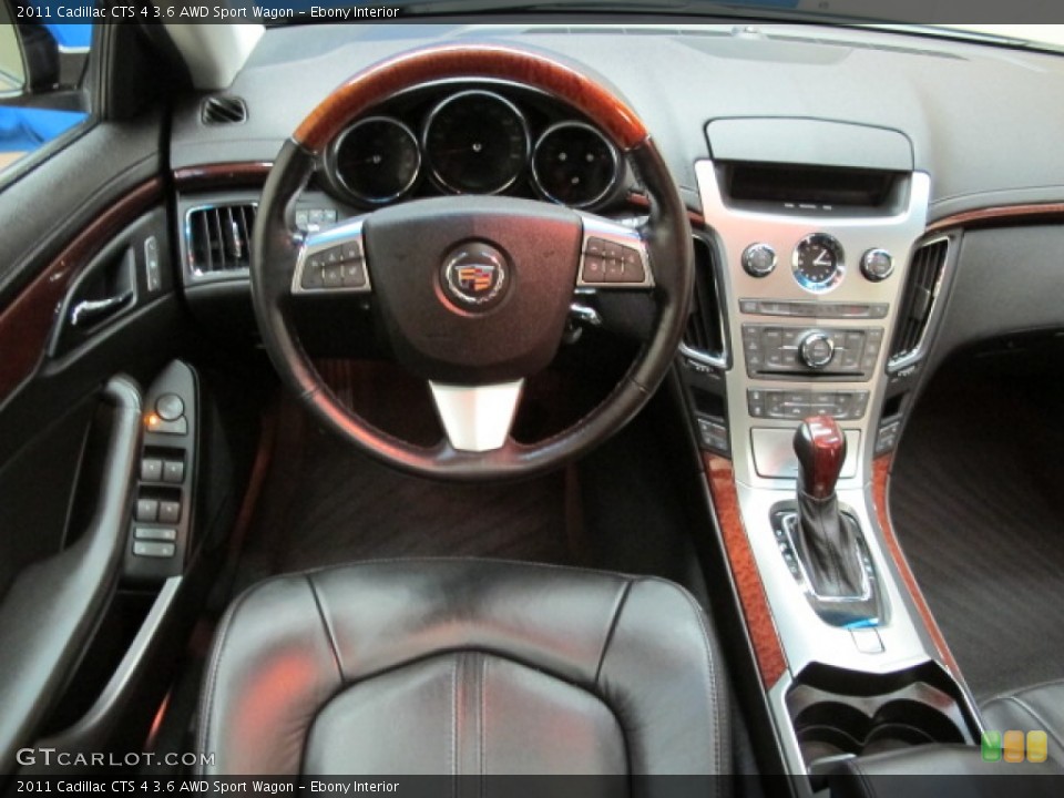 Ebony Interior Dashboard for the 2011 Cadillac CTS 4 3.6 AWD Sport Wagon #71418181
