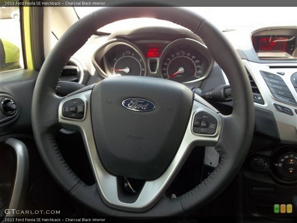 Charcoal Black Interior Steering Wheel for the 2013 Ford Fiesta SE Hatchback #71435750
