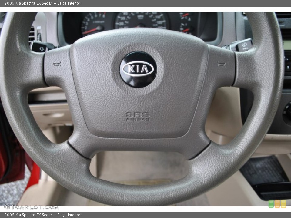 Beige Interior Steering Wheel for the 2006 Kia Spectra EX Sedan #71533441