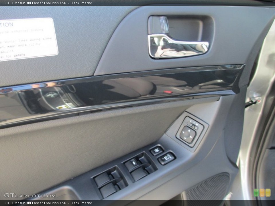 Black Interior Controls for the 2013 Mitsubishi Lancer Evolution GSR #71538516