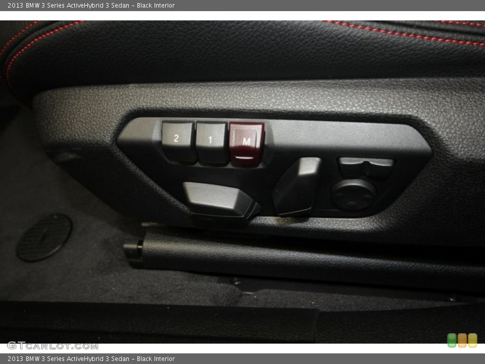 Black Interior Controls for the 2013 BMW 3 Series ActiveHybrid 3 Sedan #71552689