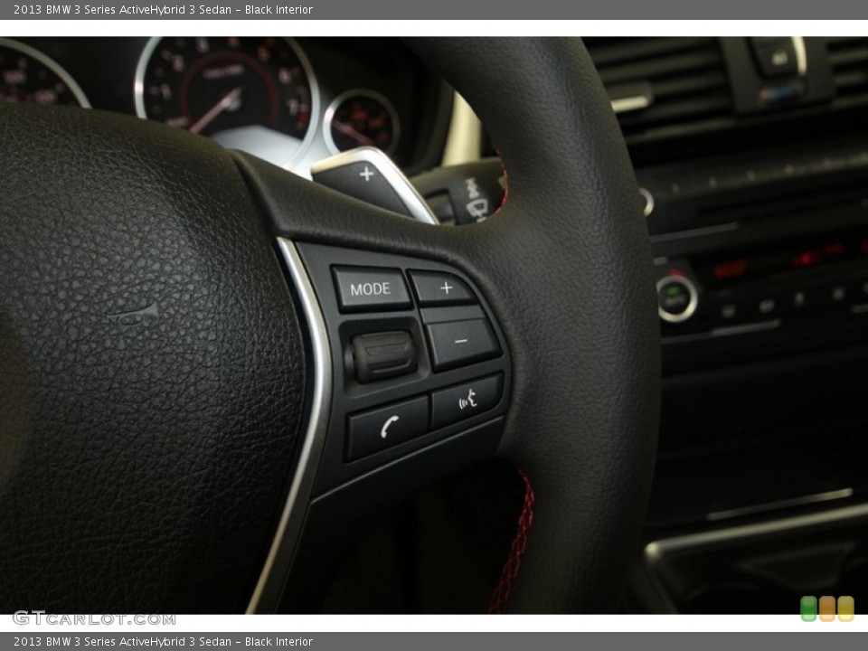 Black Interior Controls for the 2013 BMW 3 Series ActiveHybrid 3 Sedan #71552749