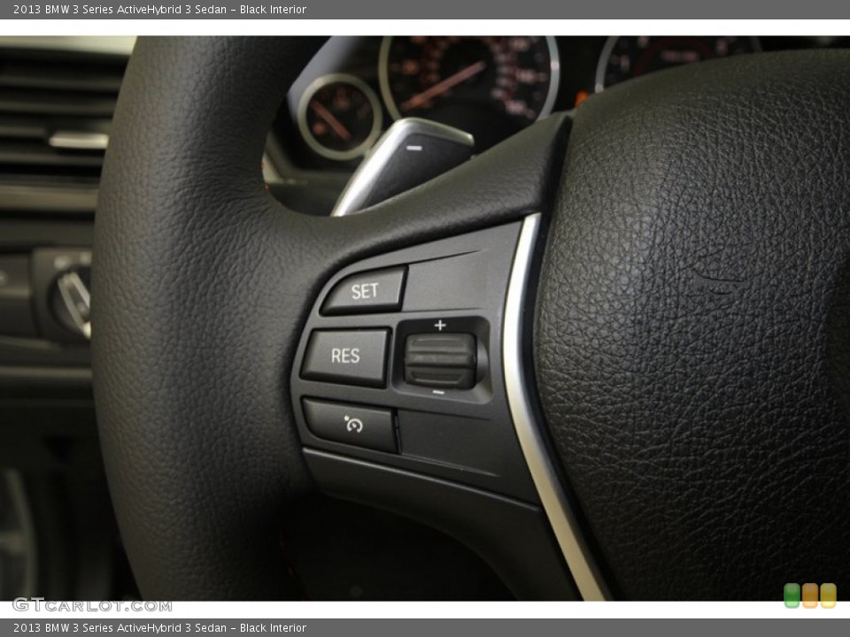 Black Interior Controls for the 2013 BMW 3 Series ActiveHybrid 3 Sedan #71552758