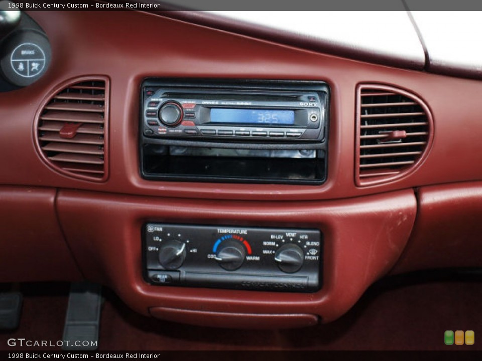 Bordeaux Red Interior Controls for the 1998 Buick Century Custom #71580656