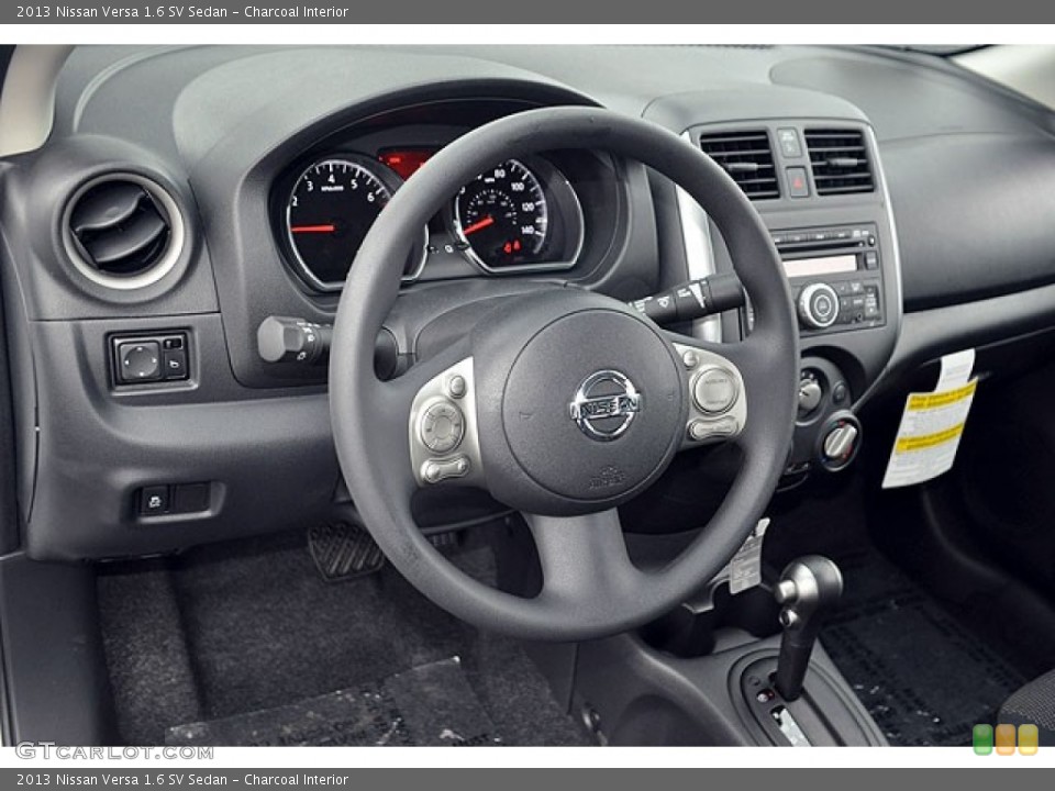 Charcoal Interior Dashboard for the 2013 Nissan Versa 1.6 SV Sedan #71634640