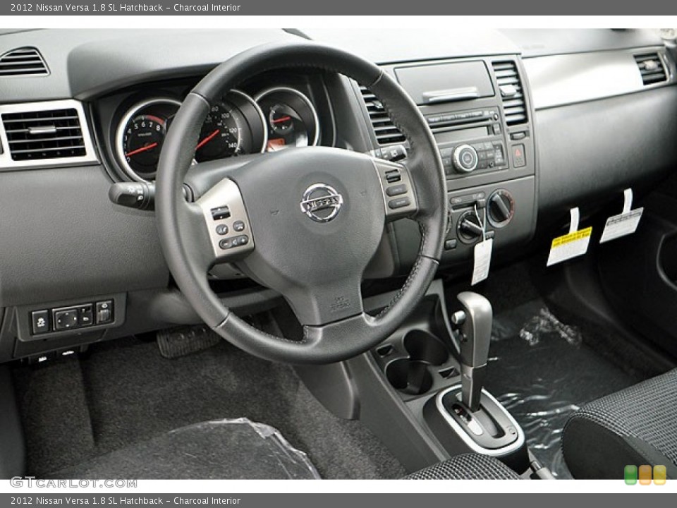Charcoal Interior Photo for the 2012 Nissan Versa 1.8 SL Hatchback #71634820